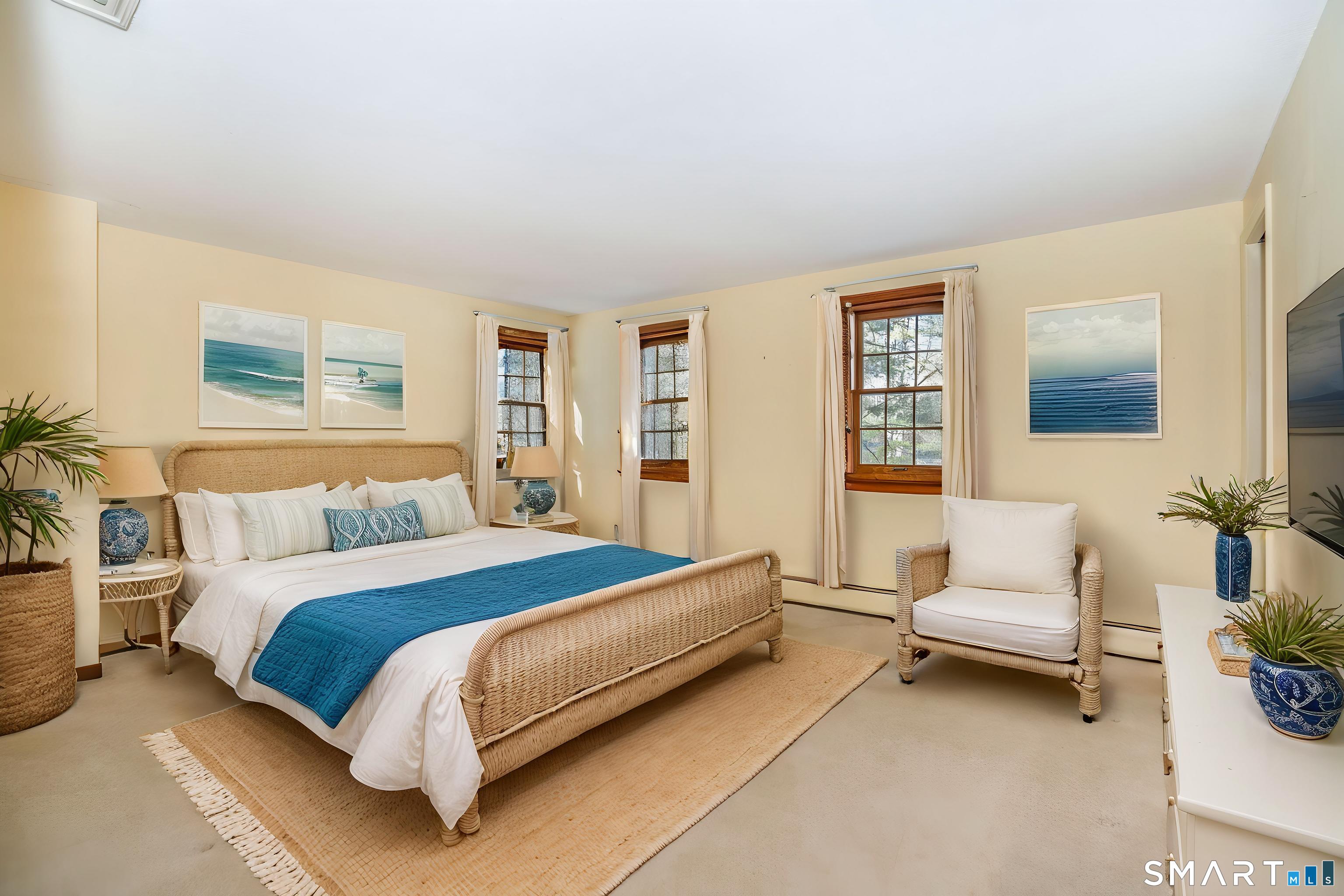 29 Long View Drive Simsbury, CT 06070 - Photo 22 of 41 a spacious bedroom with a bed and a couch