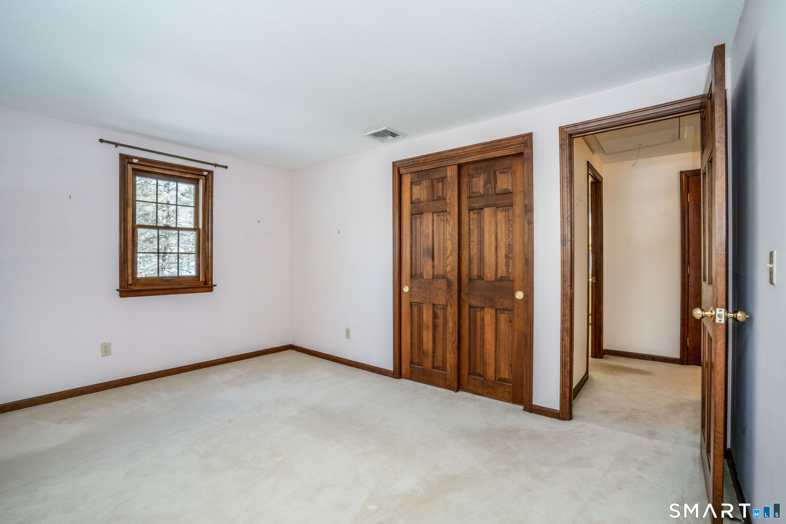 29 Long View Drive Simsbury, CT 06070 - Photo 27 of 41 an empty room with windows and closet