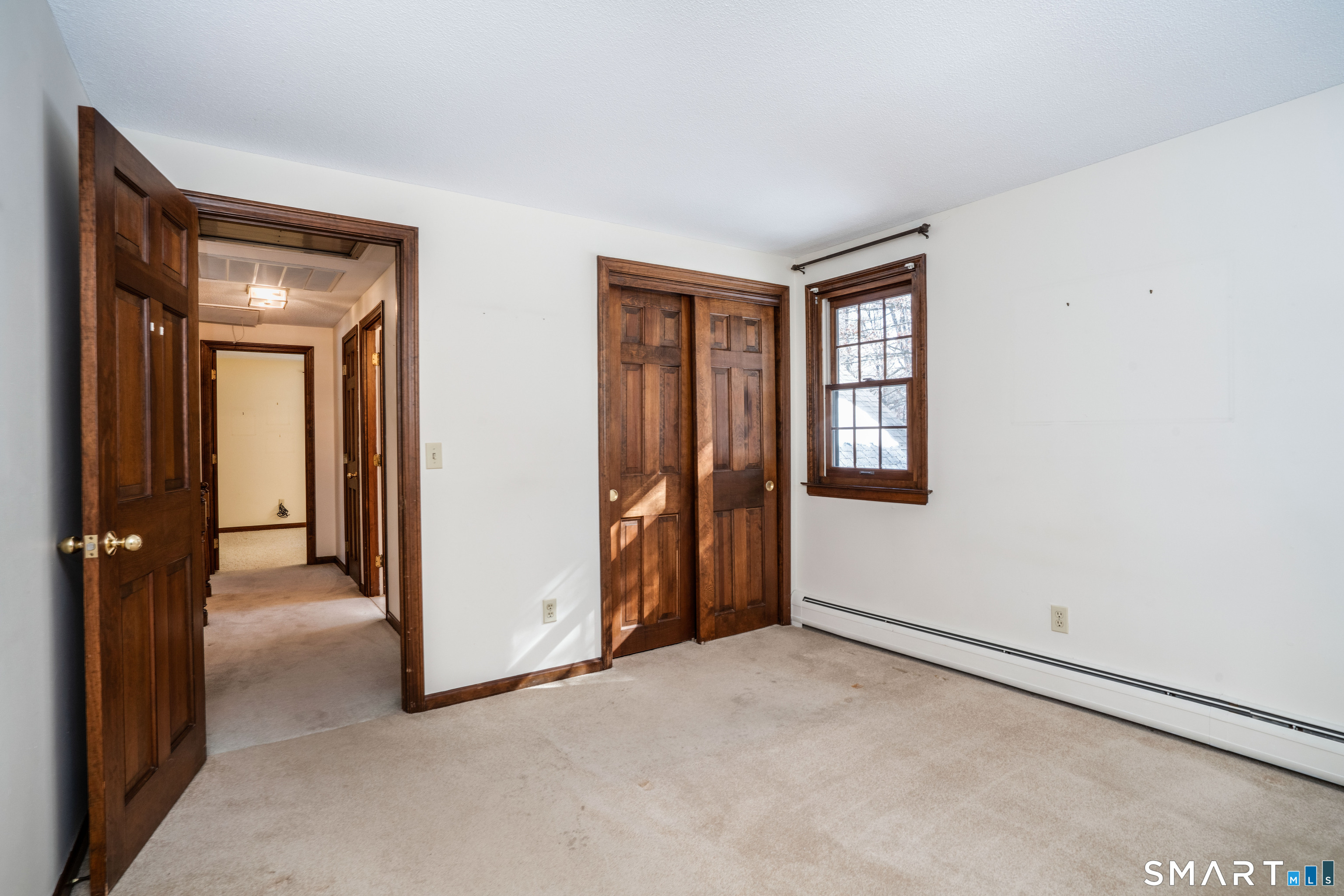 29 Long View Drive Simsbury, CT 06070 - Photo 29 of 41 an empty room with windows and closet