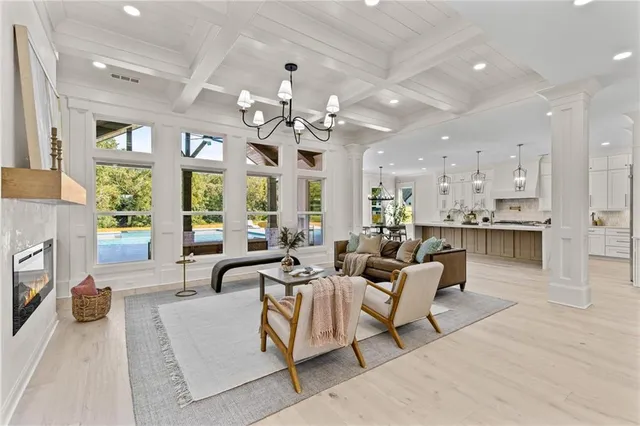 a workspace room with furniture and a window