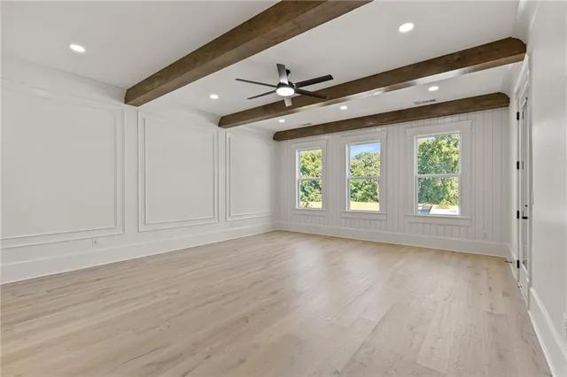 a front view of a house with swimming pool yard and outdoor seating
