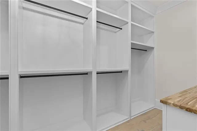 a view of a house with swimming pool and porch