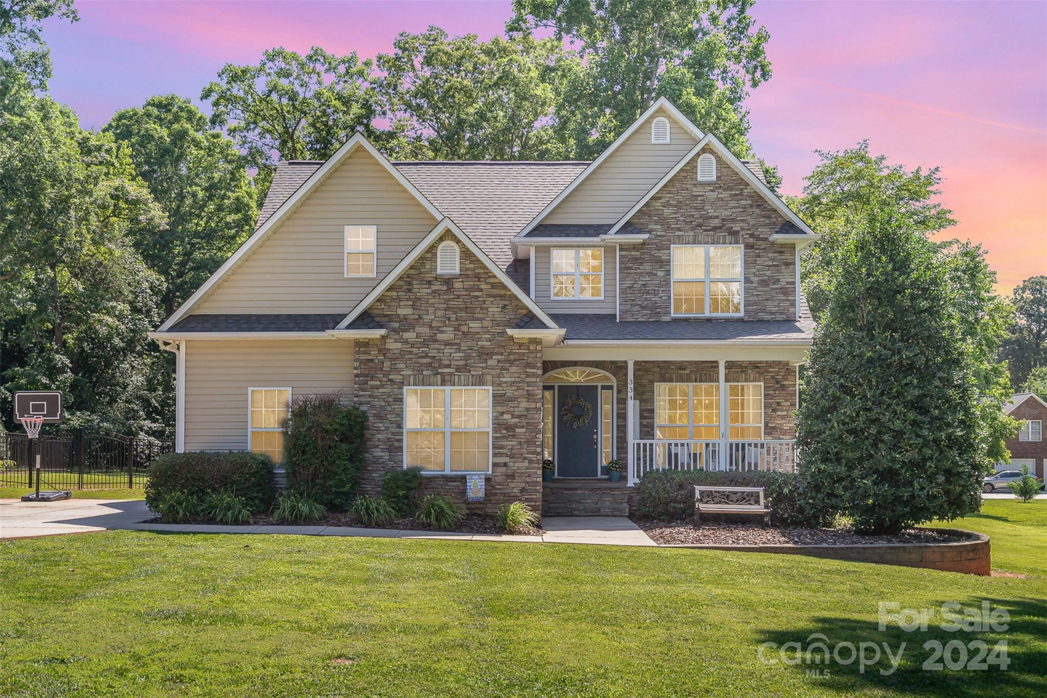 334 Adrian Road Salisbury, NC 28146 - Photo 2 of 40 a front view of a house with a yard