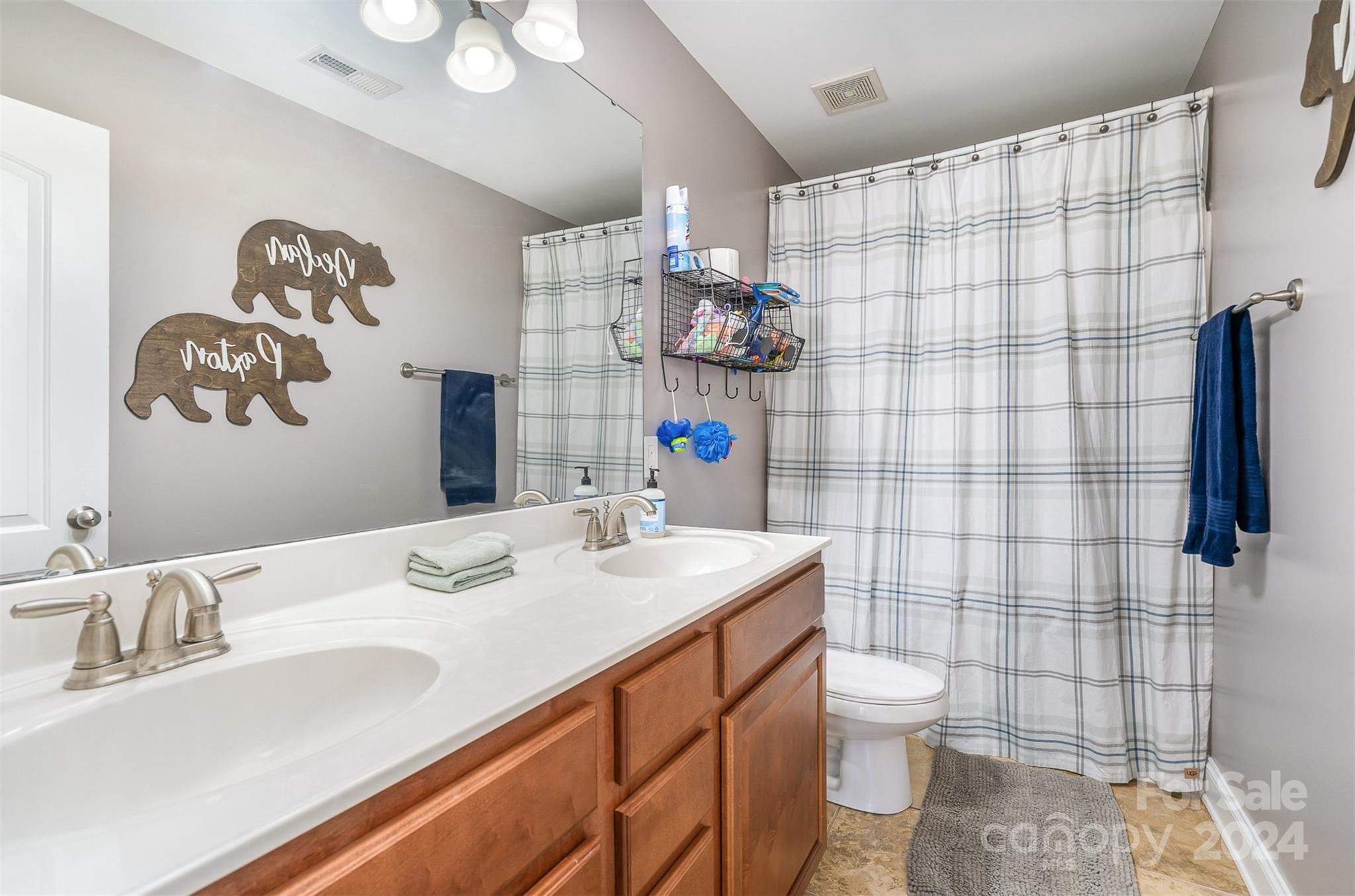 334 Adrian Road Salisbury, NC 28146 - Photo 25 of 40 a bathroom with a sink toilet and shower