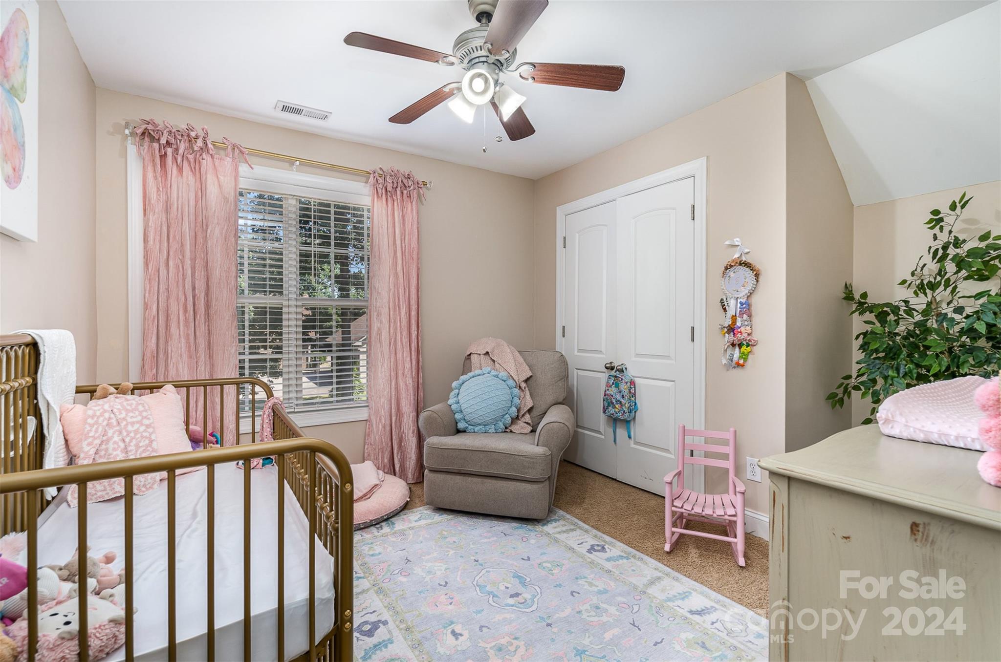 334 Adrian Road Salisbury, NC 28146 - Photo 26 of 40 a bedroom with furniture and a large window
