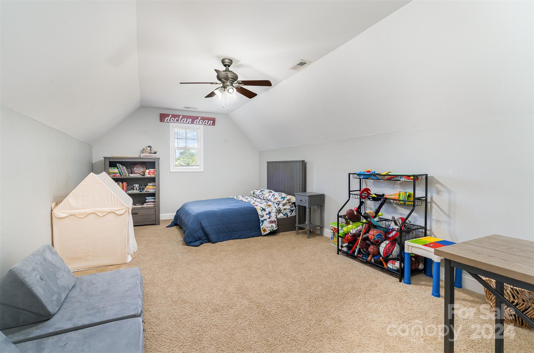 334 Adrian Road Salisbury, NC 28146 - Photo 27 of 40 a bedroom with furniture and a bed