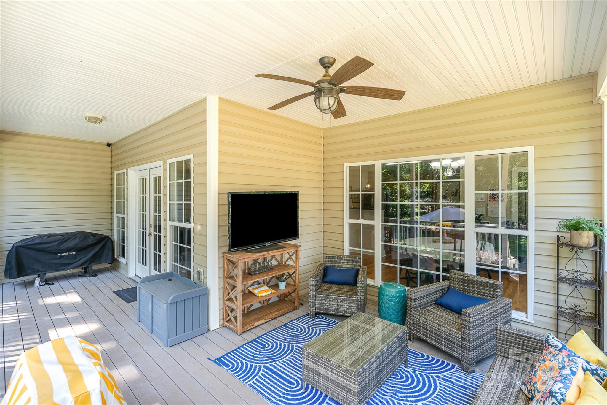 334 Adrian Road Salisbury, NC 28146 - Photo 29 of 40 a living room with furniture and a flat screen tv