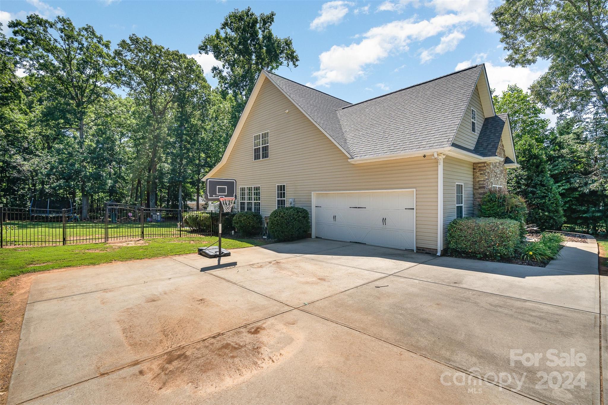 334 Adrian Road Salisbury, NC 28146 - Photo 31 of 40 a view of backyard with swimming pool and seating space