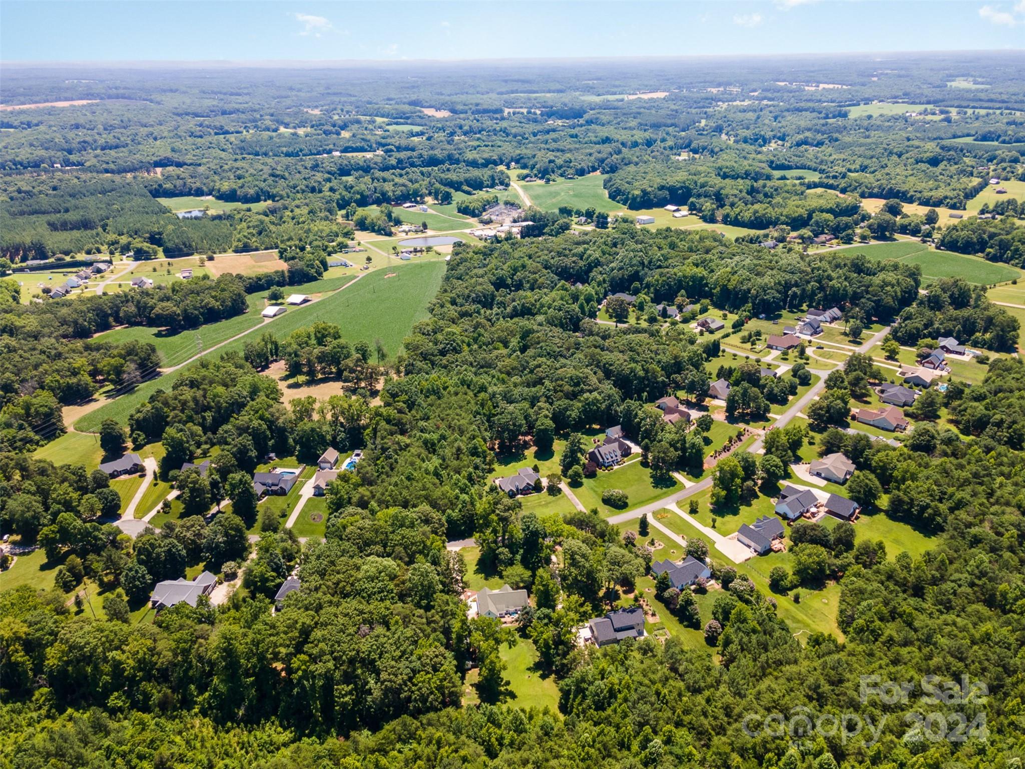 334 Adrian Road Salisbury, NC 28146 - Photo 38 of 40 an aerial view of a city with lots of residential buildings