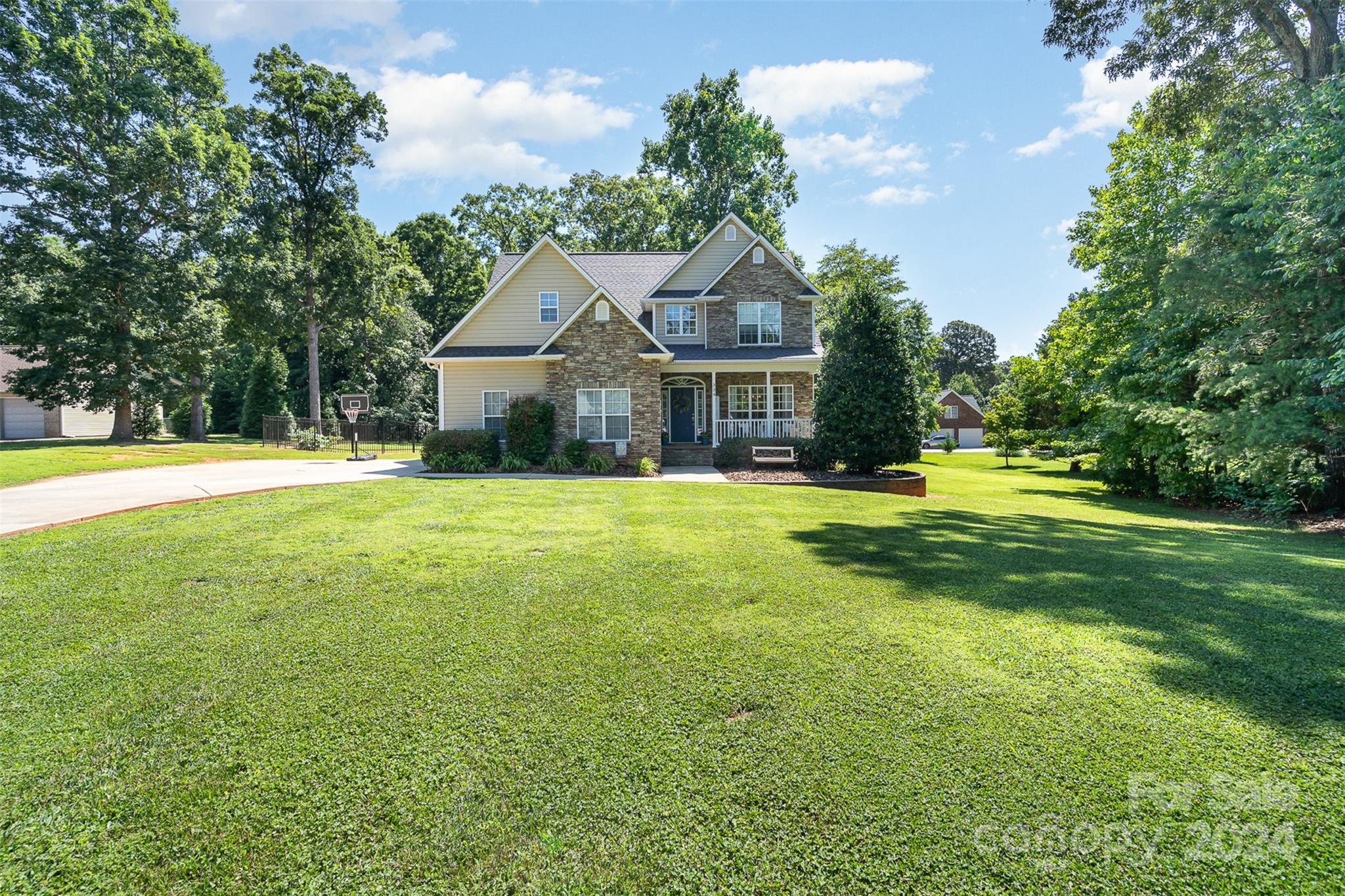 334 Adrian Road Salisbury, NC 28146 - Photo 6 of 40 a front view of a house with a yard
