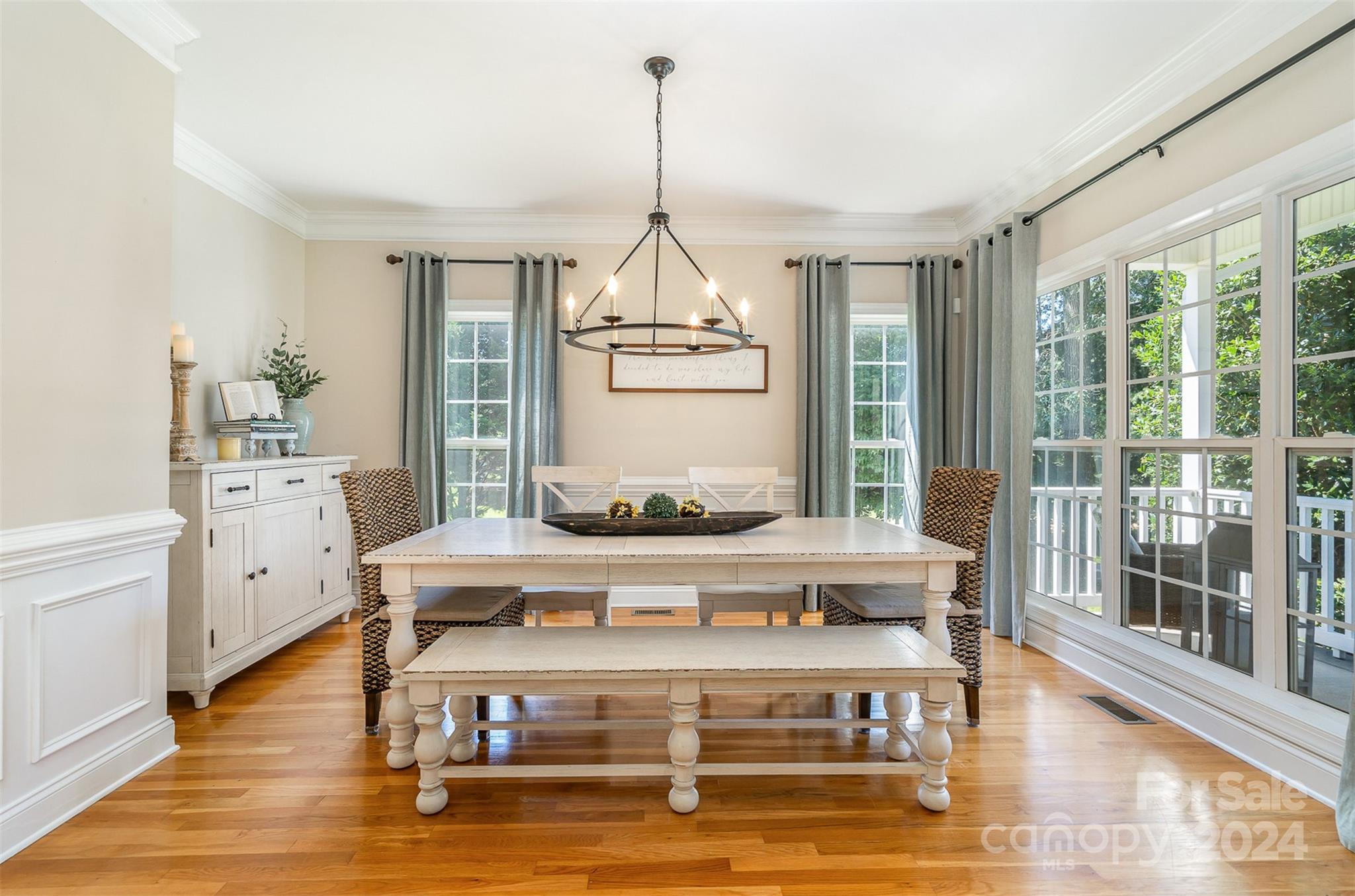 334 Adrian Road Salisbury, NC 28146 - Photo 8 of 40 a room with wooden floors and white walls