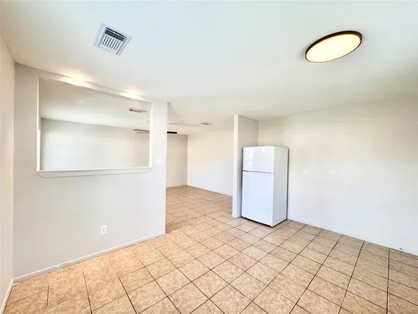 a view of small space with wooden floor