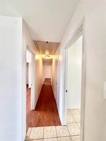 a view of hallway with stairs