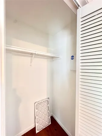 a view of small space with wooden floor