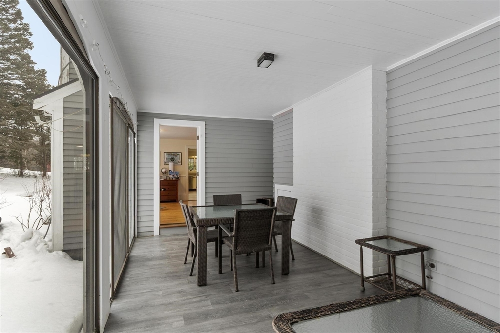 454 Wilson Street Clinton, MA 01510 - Photo 26 of 39 a view of a dining room with furniture window and wooden floor