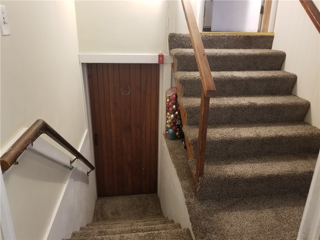 1341 Diamond Hill Road Cumberland, RI 02864 - Photo 10 of 15 stairs from main house kitchen at landing is in law door at bottom leads to basement area