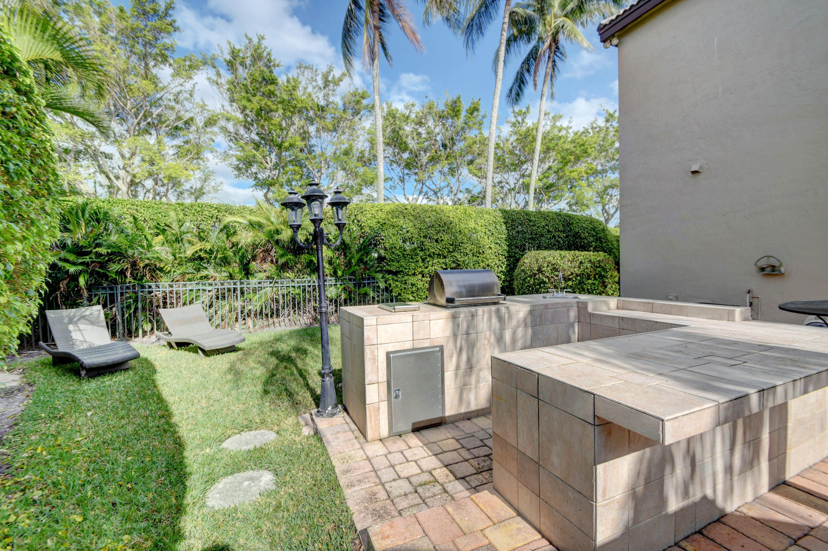3387 Northwest 53rd Circle Boca Raton, FL 33496 - Photo 7 of 29 Summer Kitchen - 2