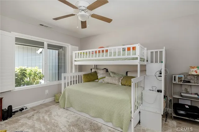a bathroom with a sink a vanity and a mirror