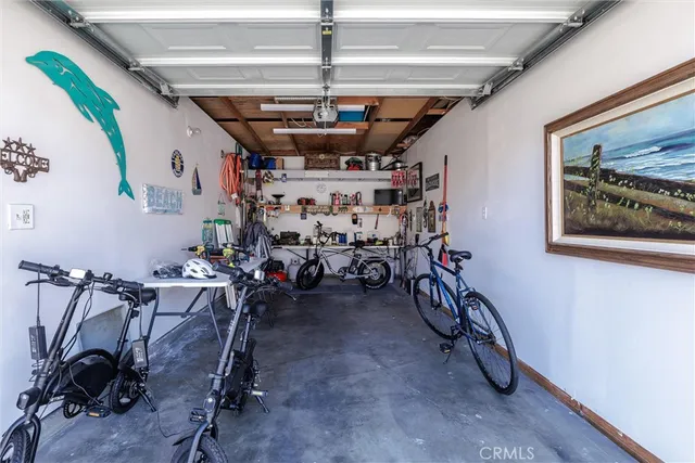 a view of a swimming pool with lounge chairs