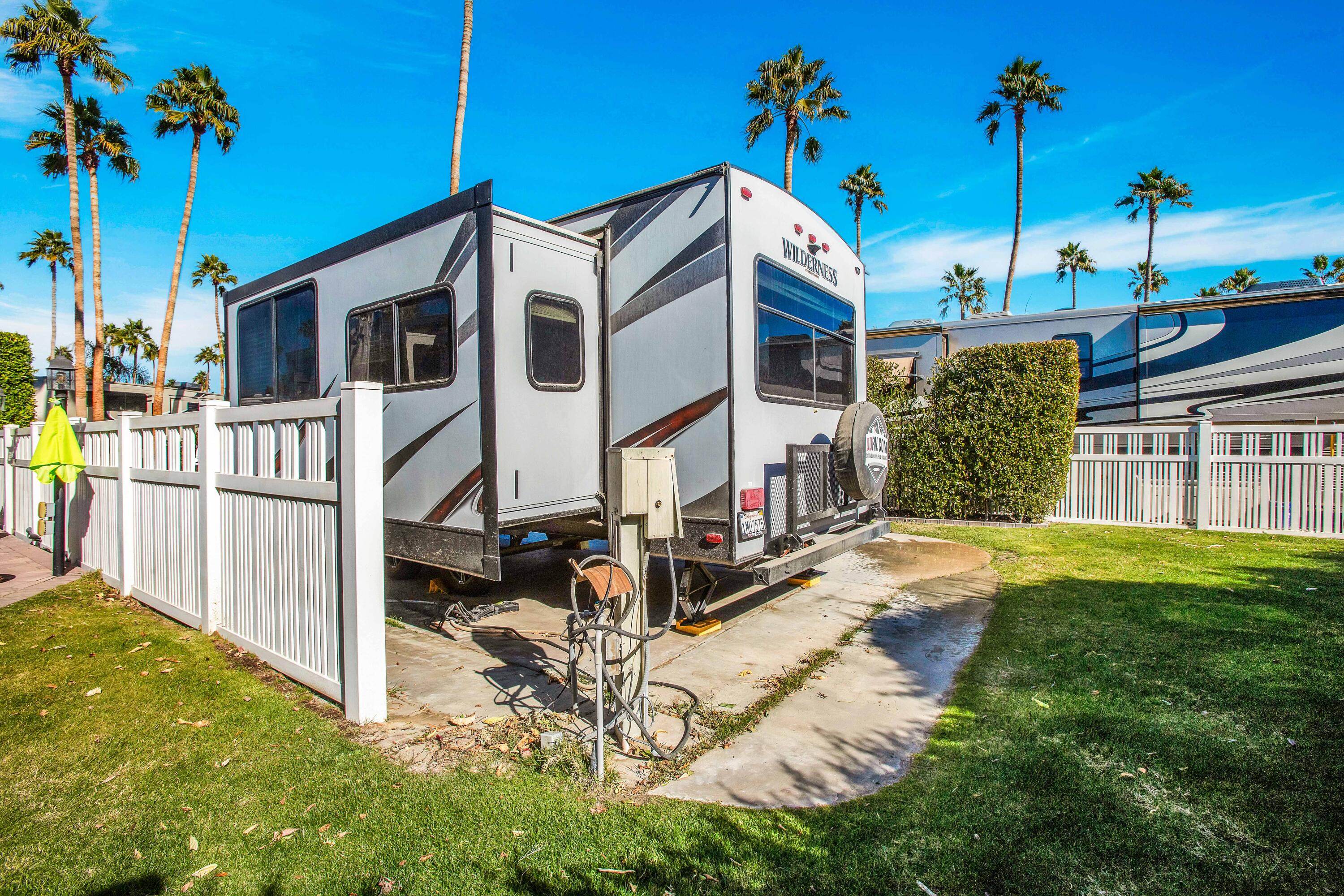 69411 Ramon Road, Unit 269 Cathedral City, CA 92234 - Photo 12 of 62 a view of a house with backyard