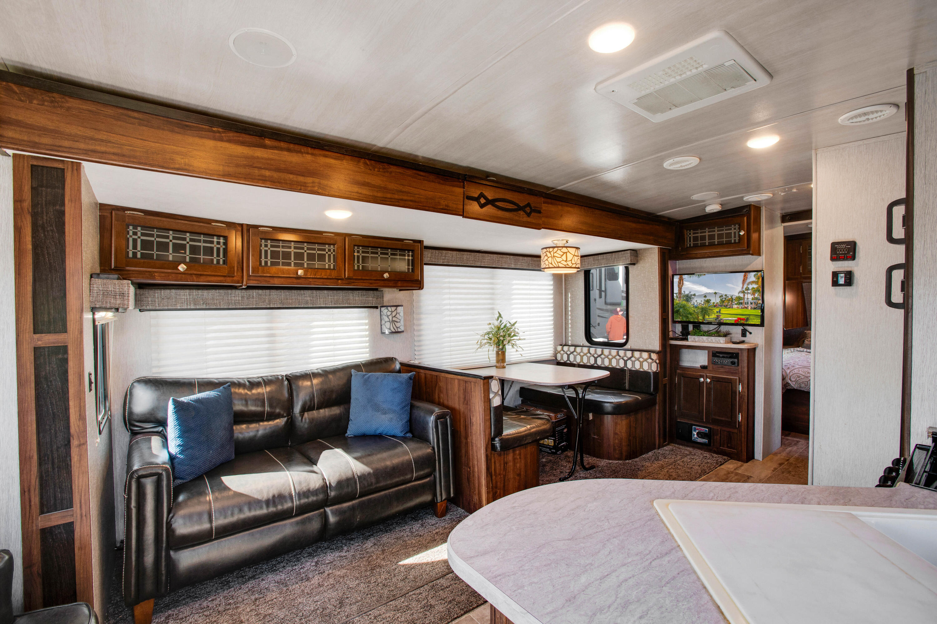 69411 Ramon Road, Unit 269 Cathedral City, CA 92234 - Photo 14 of 62 a living room with stainless steel appliances kitchen island granite countertop furniture and a fireplace