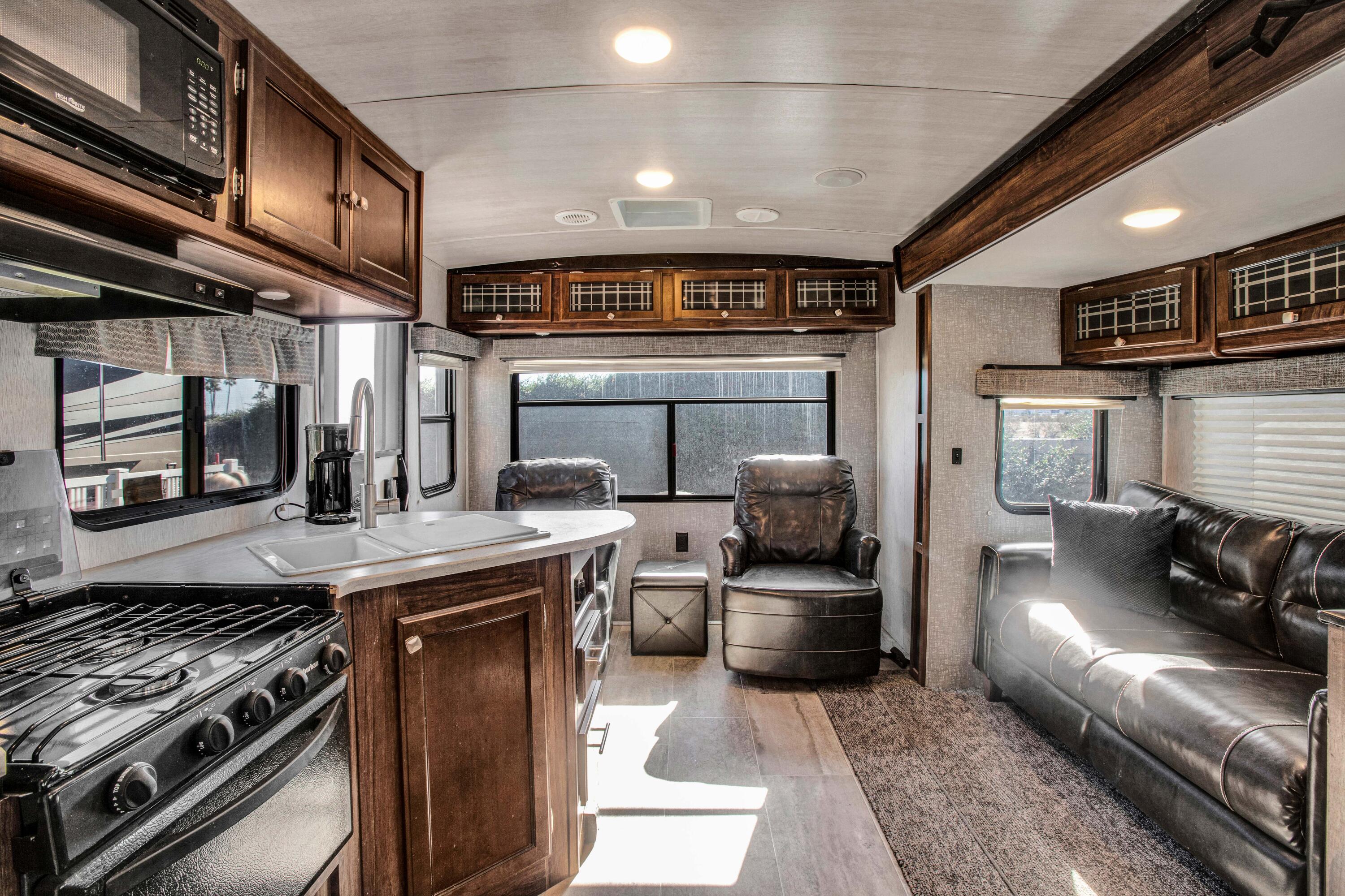 69411 Ramon Road, Unit 269 Cathedral City, CA 92234 - Photo 17 of 62 a kitchen with stainless steel appliances granite countertop a stove and a sink