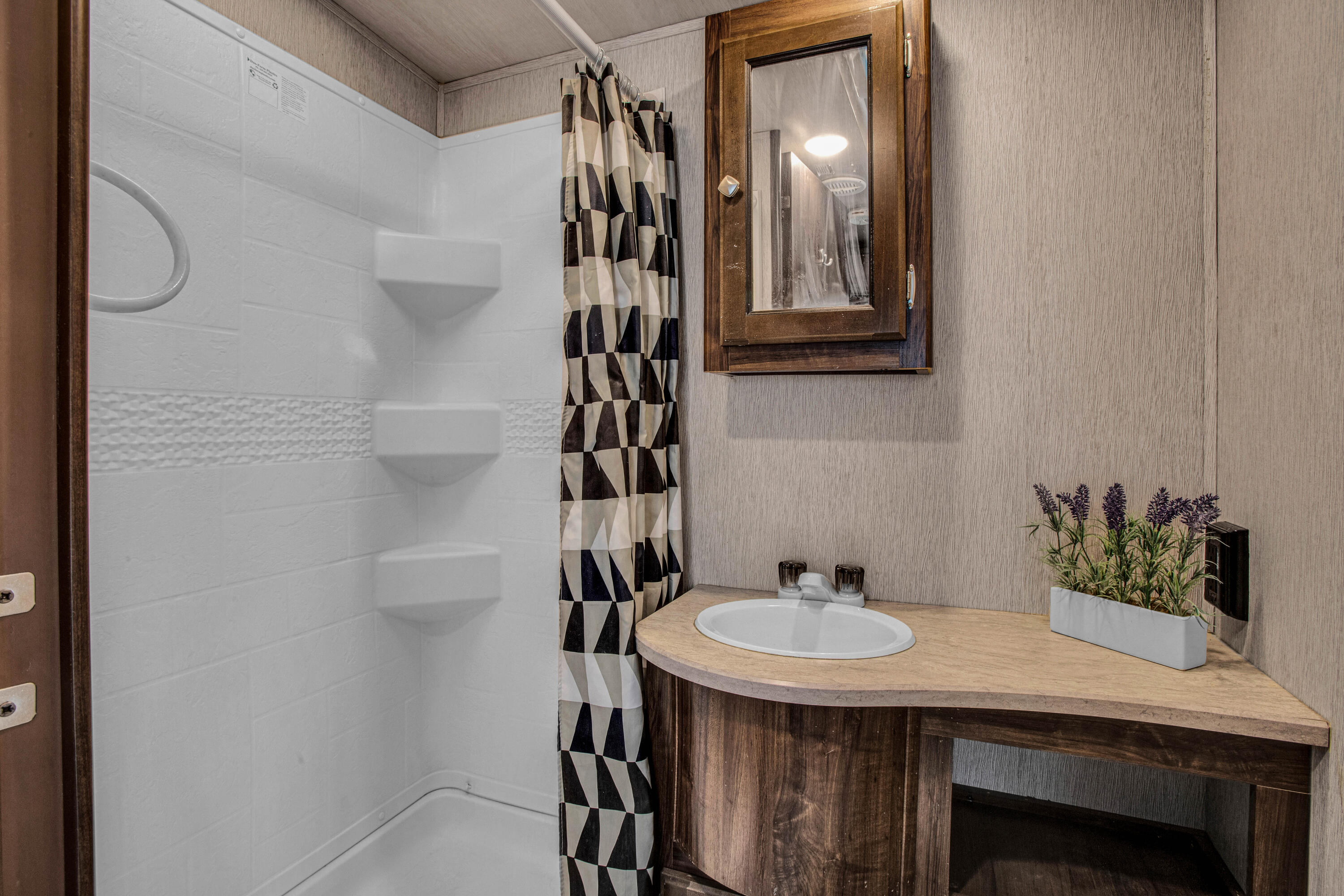 69411 Ramon Road, Unit 269 Cathedral City, CA 92234 - Photo 19 of 62 a bathroom with a sink and a mirror