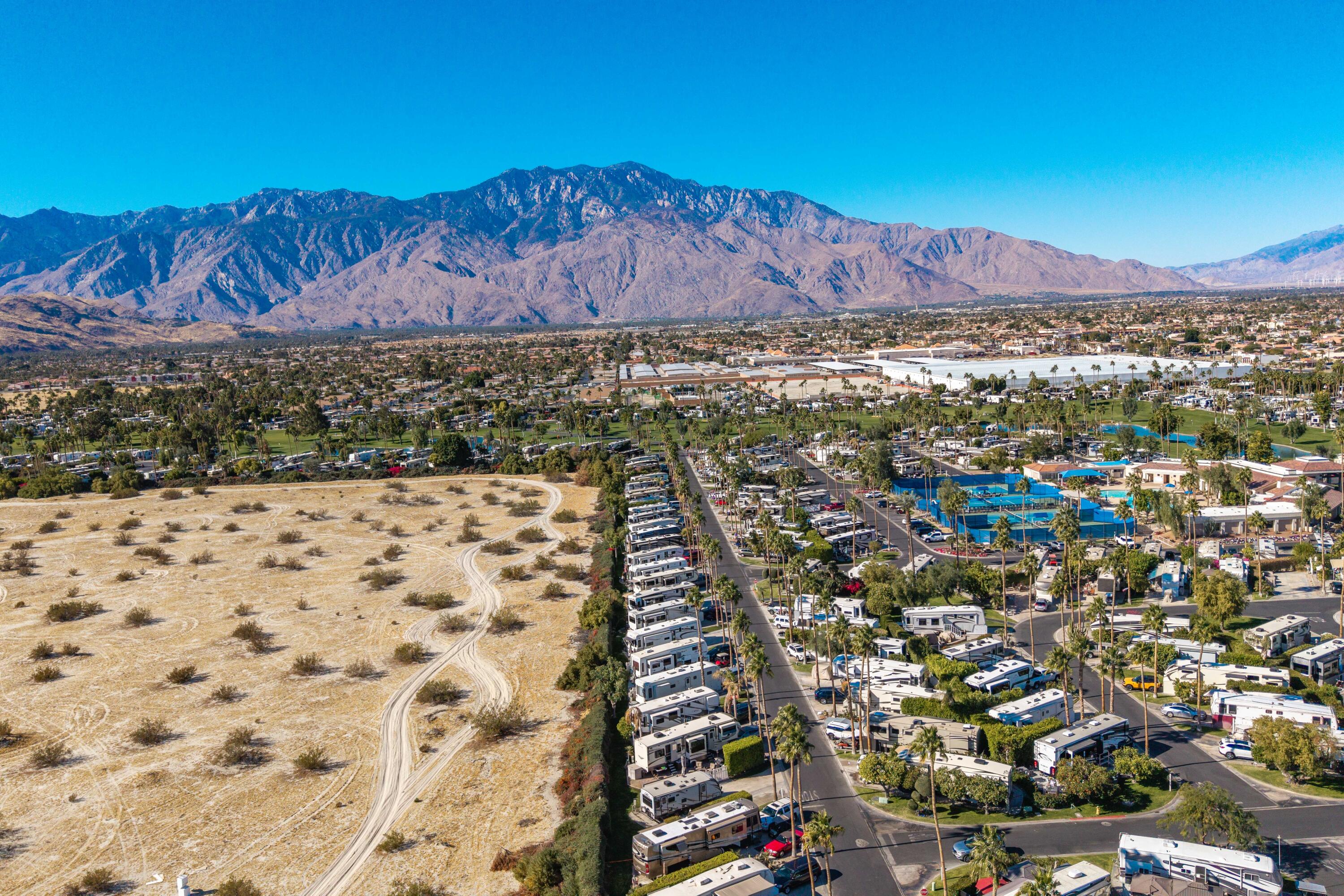69411 Ramon Road, Unit 269 Cathedral City, CA 92234 - Photo 27 of 62 a view of a city with mountains in the background