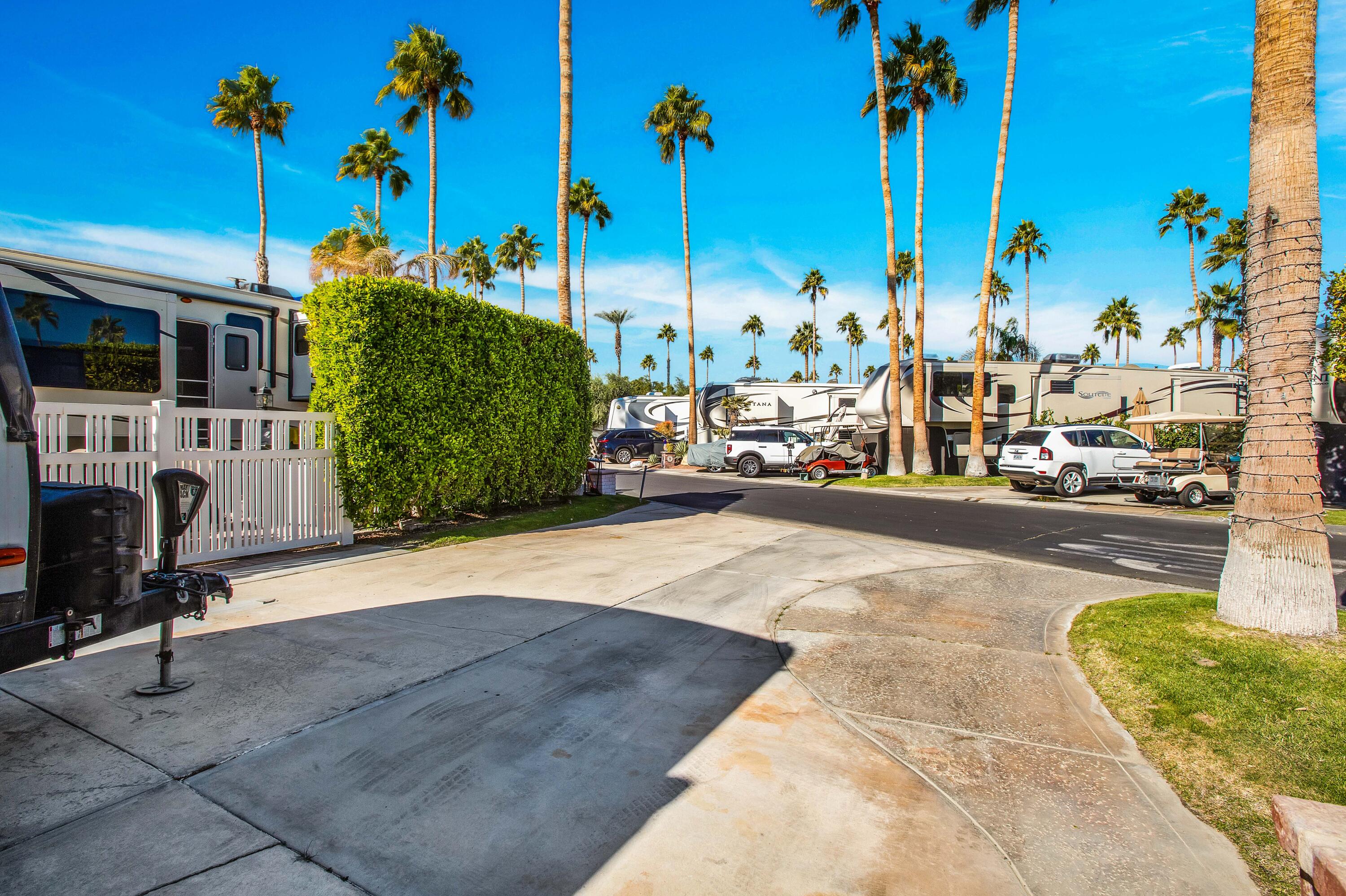 69411 Ramon Road, Unit 269 Cathedral City, CA 92234 - Photo 9 of 62 a view of a swimming pool with a lounge chairs