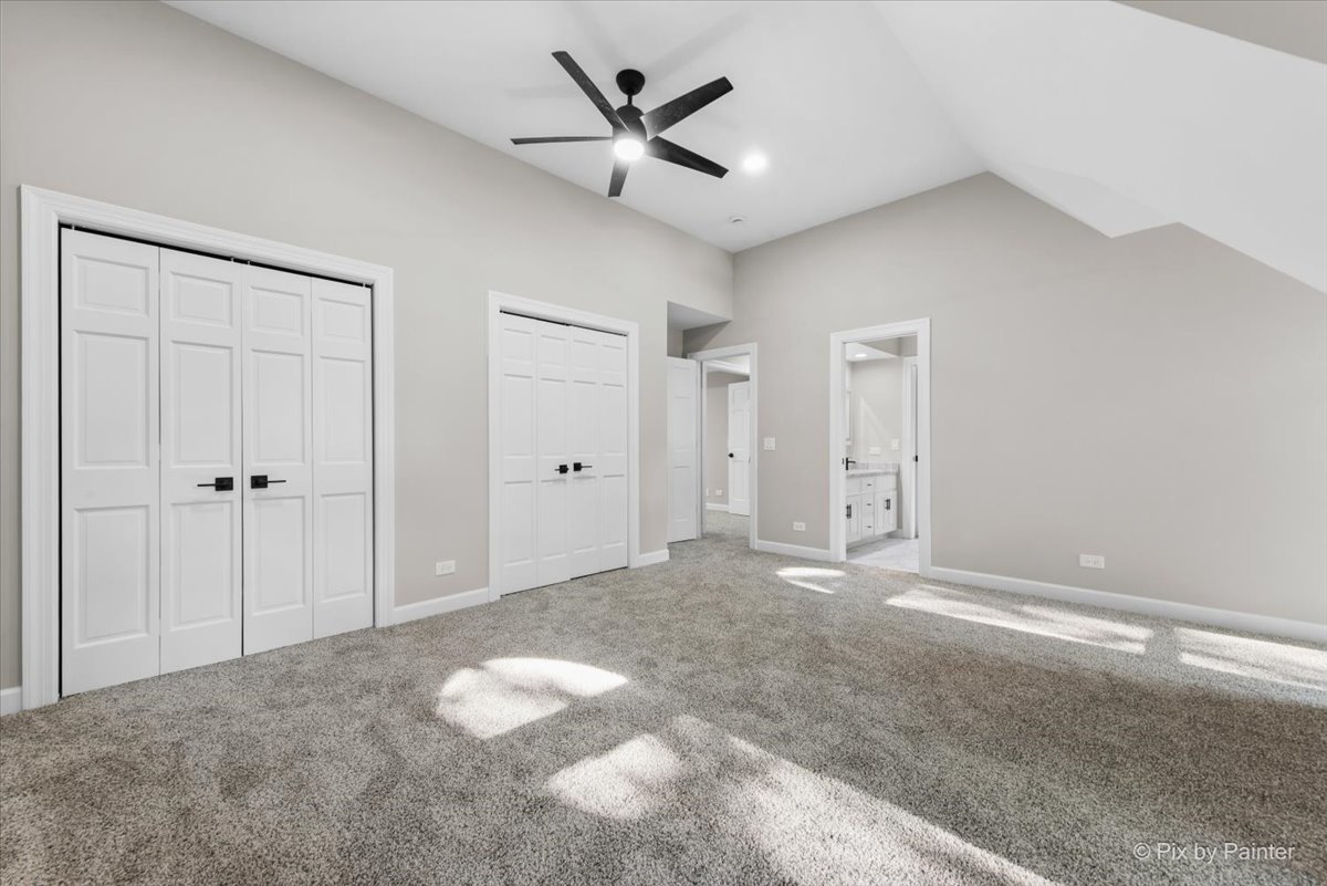 4N633 Hidden Oaks Road St. Charles, IL 60175 - Photo 33 of 49 a view of a livingroom with a ceiling fan and window