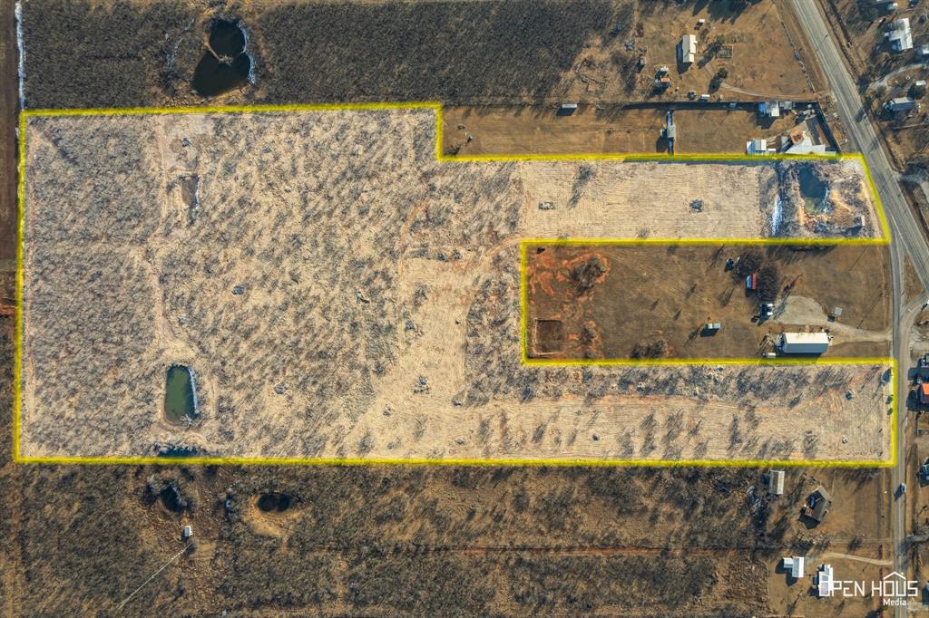 8620 Seymour Highway, Unit R Wichita Falls, TX 76310 - Photo 10 of 22 a bathroom with a sink and a mirror