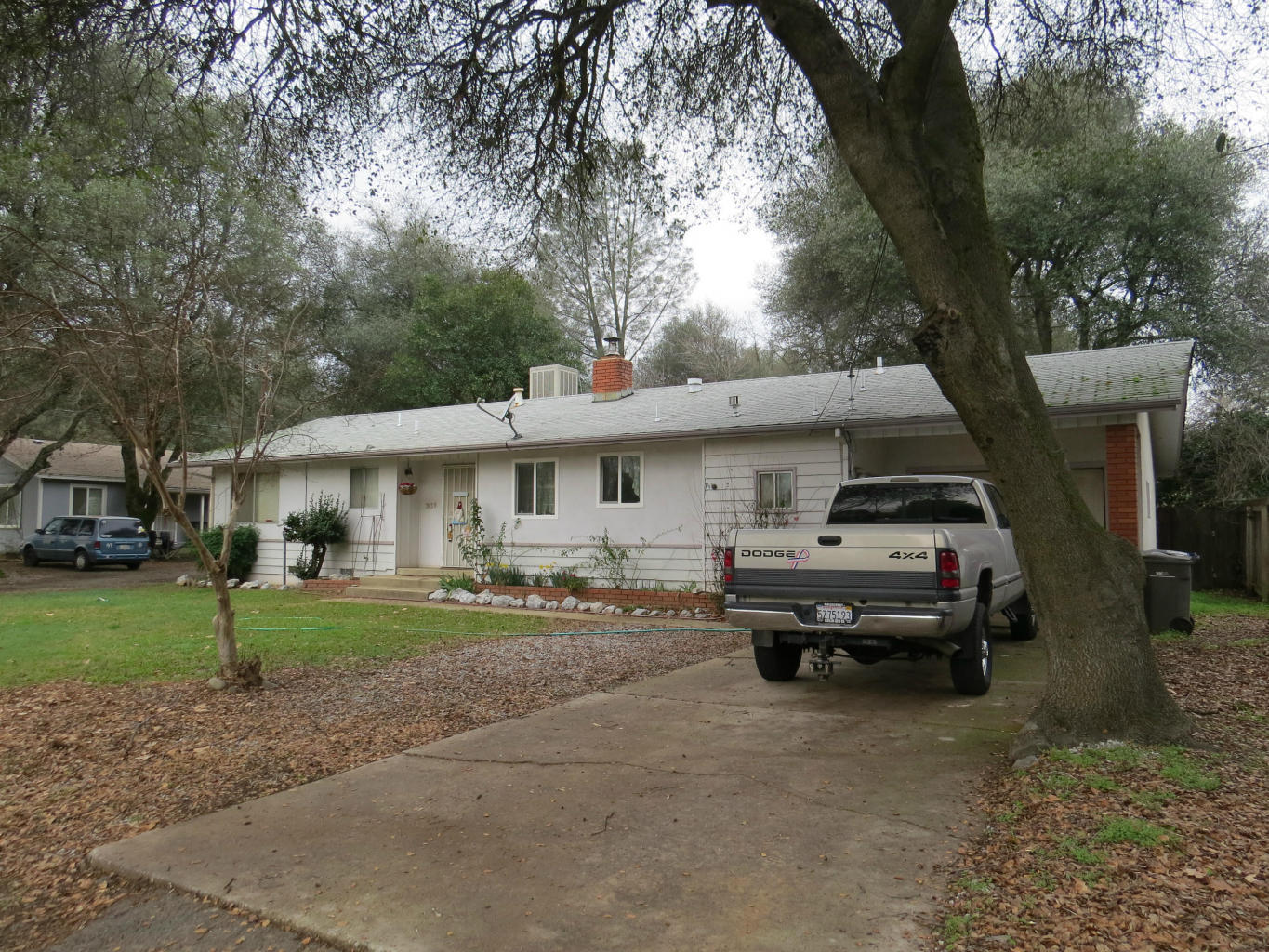 7658-7652 Happy V Road Anderson, CA 96007 - Photo 1 of 3 a view of a car in front of house