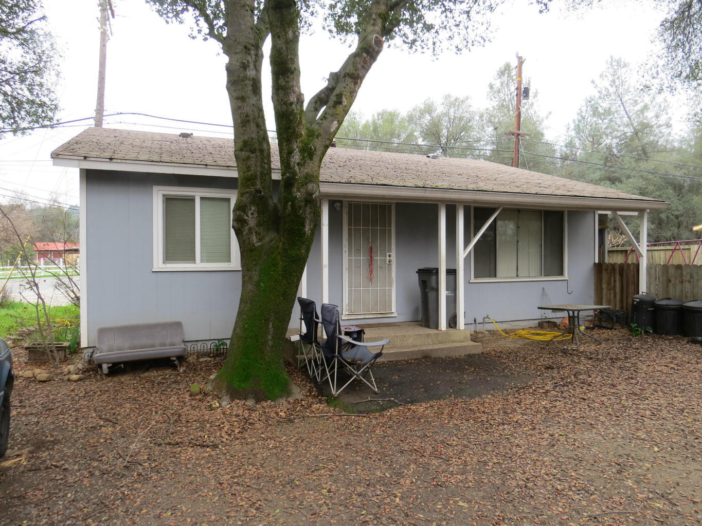 7658-7652 Happy V Road Anderson, CA 96007 - Photo 2 of 3 a view of a house with backyard
