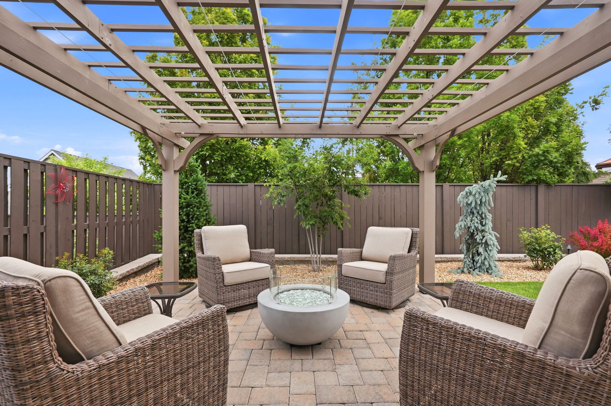 2714 Northwest 23rd Street Redmond, OR 97756 - Photo 36 of 57 a outdoor living space with furniture and garden view