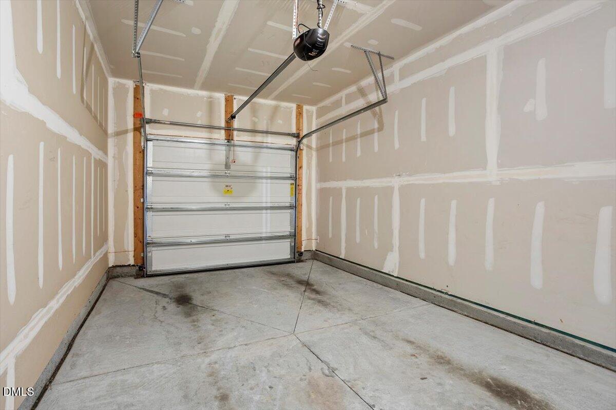 2306 Stoney Spring Drive Raleigh, NC 27610 - Photo 25 of 35 Front Entry Garage