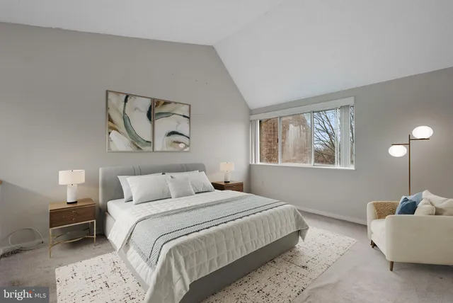 a bedroom with bed and window