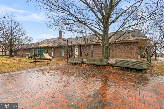a house with trees in front of it