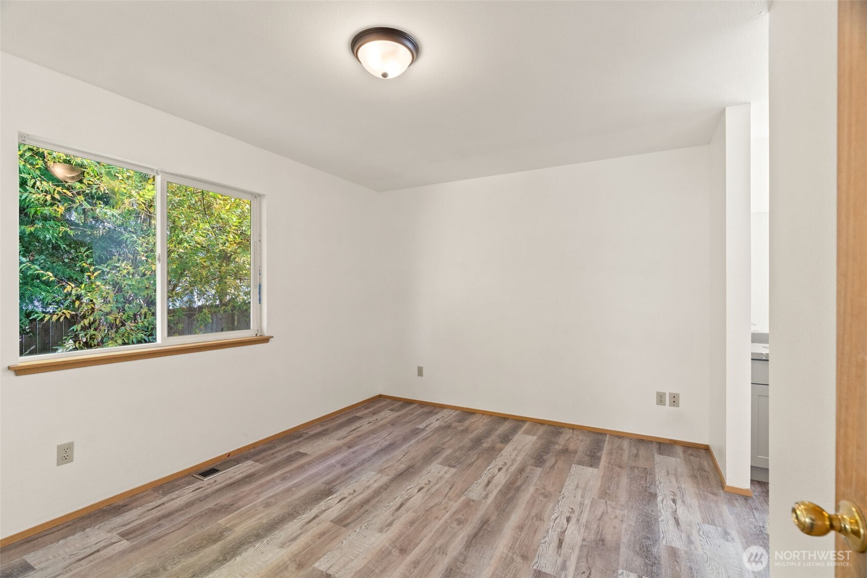 4021 167th Street Northeast, Unit A Arlington, WA 98223 - Photo 11 of 23 an empty room with a window