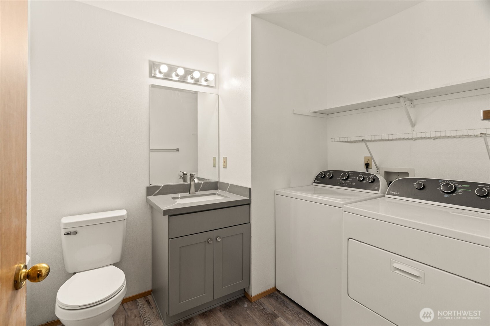 4021 167th Street Northeast, Unit A Arlington, WA 98223 - Photo 18 of 23 a bathroom with a toilet sink and mirror