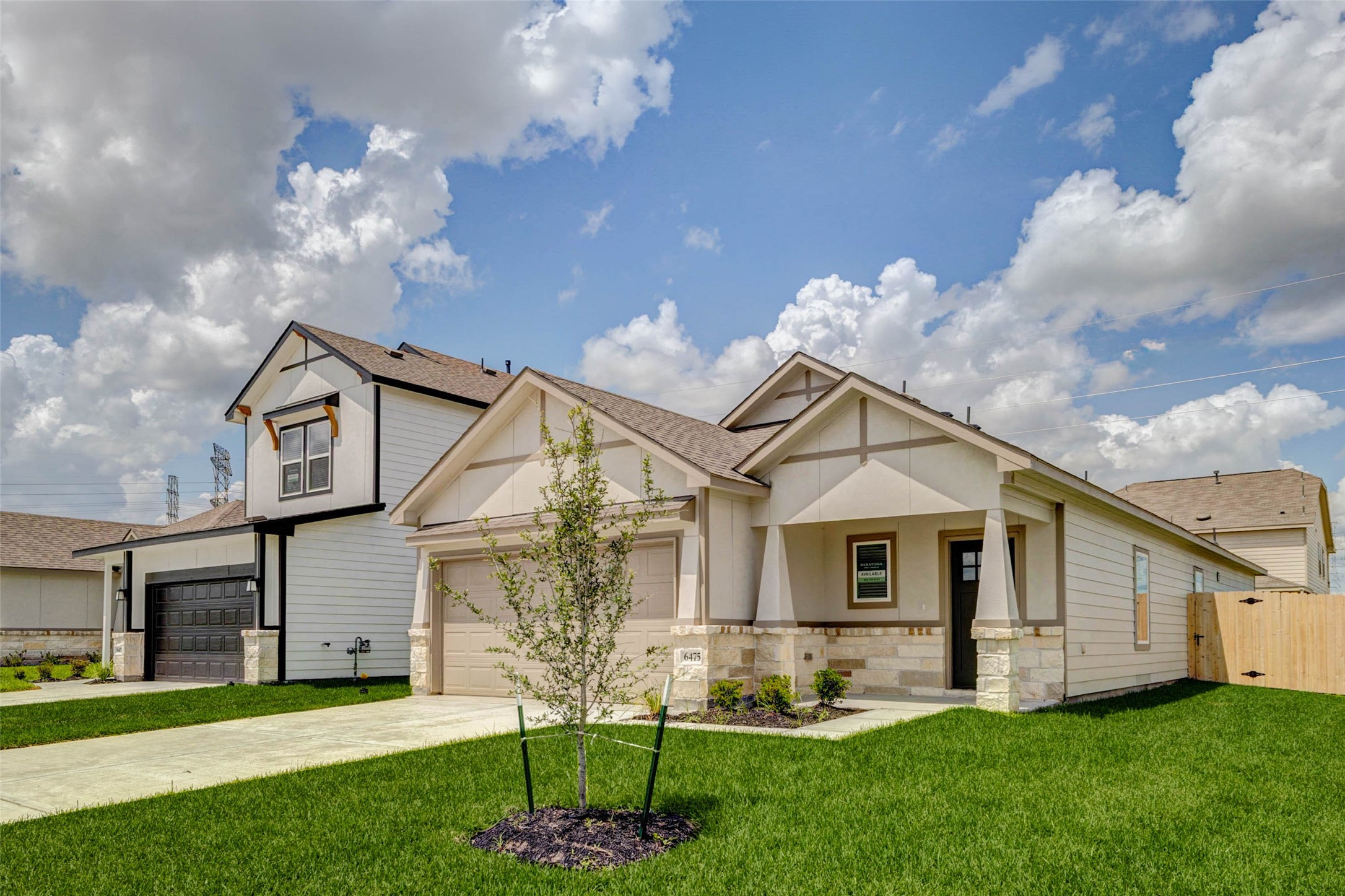 6475 Escondido Drive Rosharon, TX 77583 - Photo 1 of 32 Beautiful curb appeal welcomes you home with a fresh, modern exterior, charming gable details, stone accents, and a manicured front lawn. The covered entry, attached garage, and clean architectural lines create a warm first impression, while the bright sky and open surroundings highlight the home’s inviting presence and move-in-ready feel.