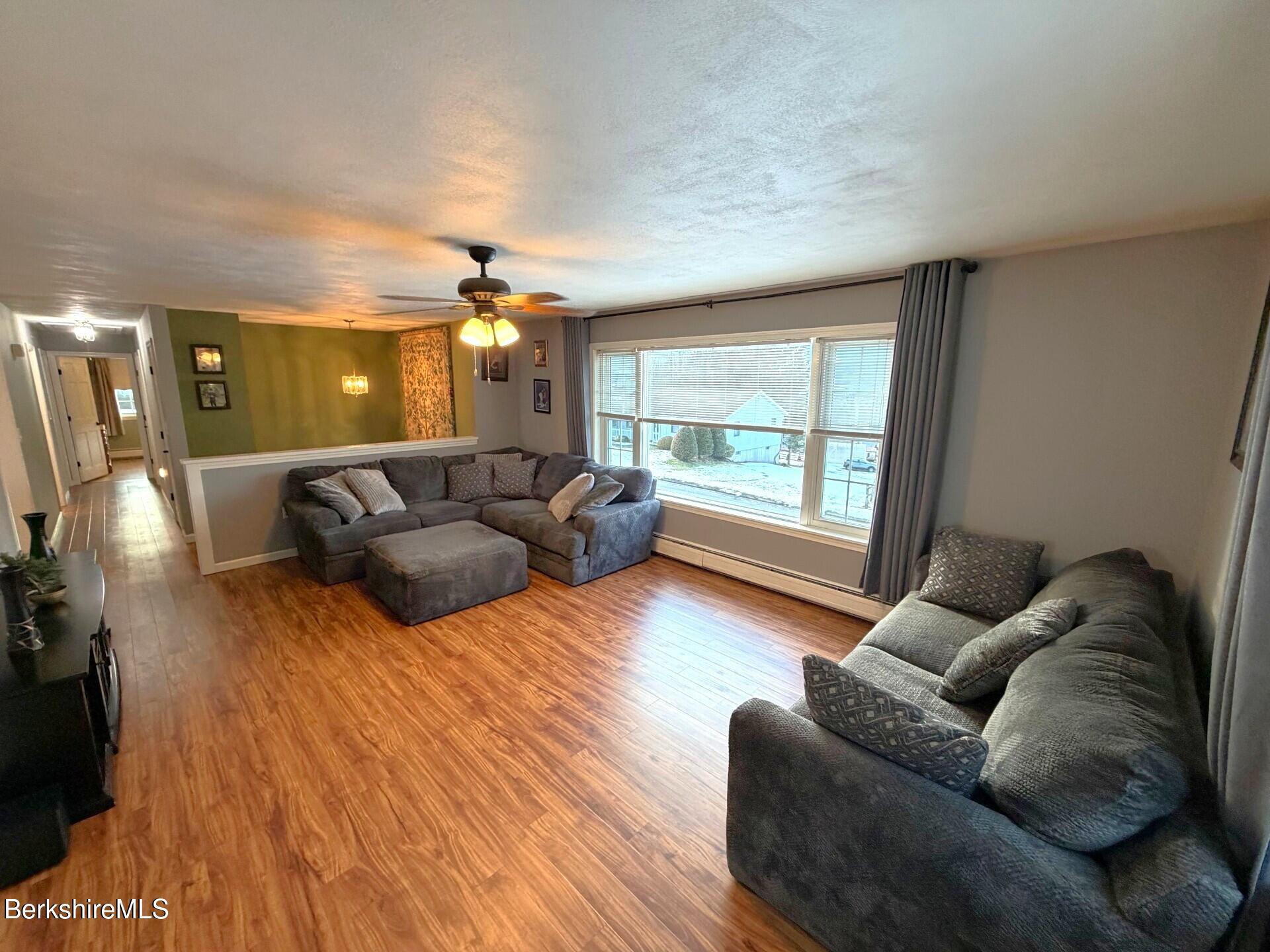 8 Country Road Adams, MA 01220 - Photo 14 of 44 a living room with furniture and a large window