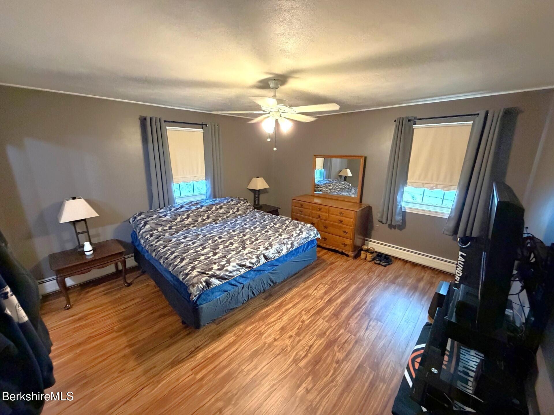 8 Country Road Adams, MA 01220 - Photo 17 of 44 a bedroom with a bed dresser and a window