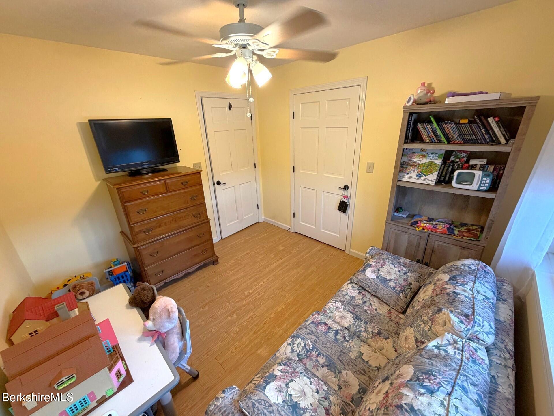 8 Country Road Adams, MA 01220 - Photo 25 of 44 a bedroom with a bed and flat screen tv