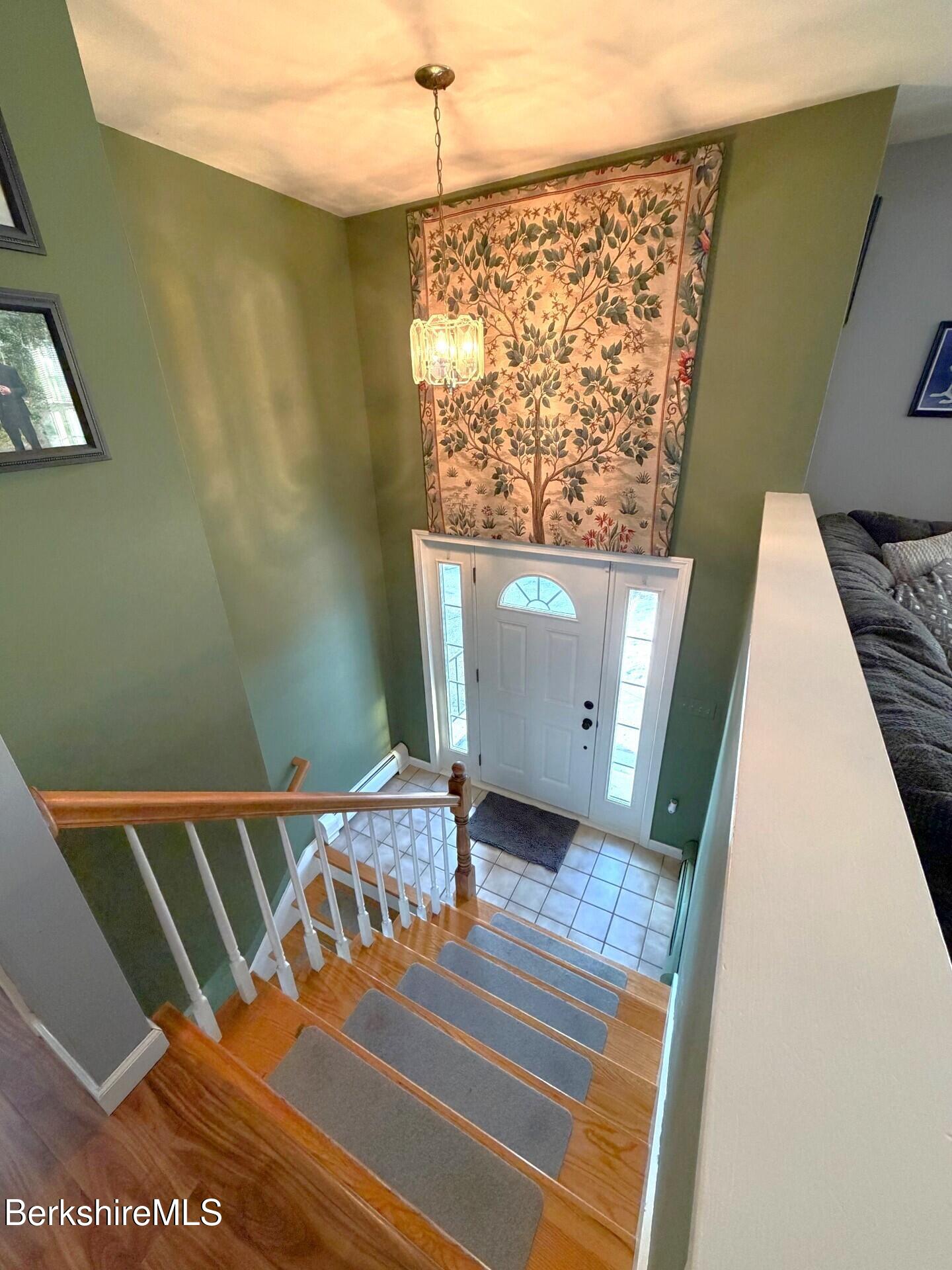 8 Country Road Adams, MA 01220 - Photo 28 of 44 a view of a hallway with wooden floor and staircase