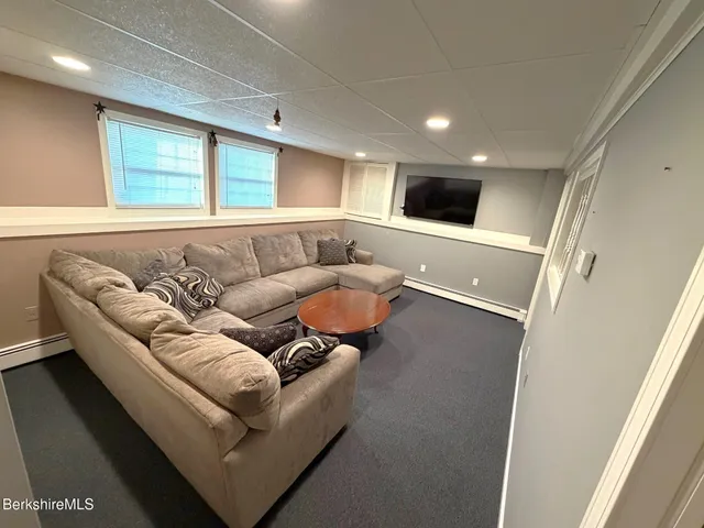 a living room with furniture and a couch