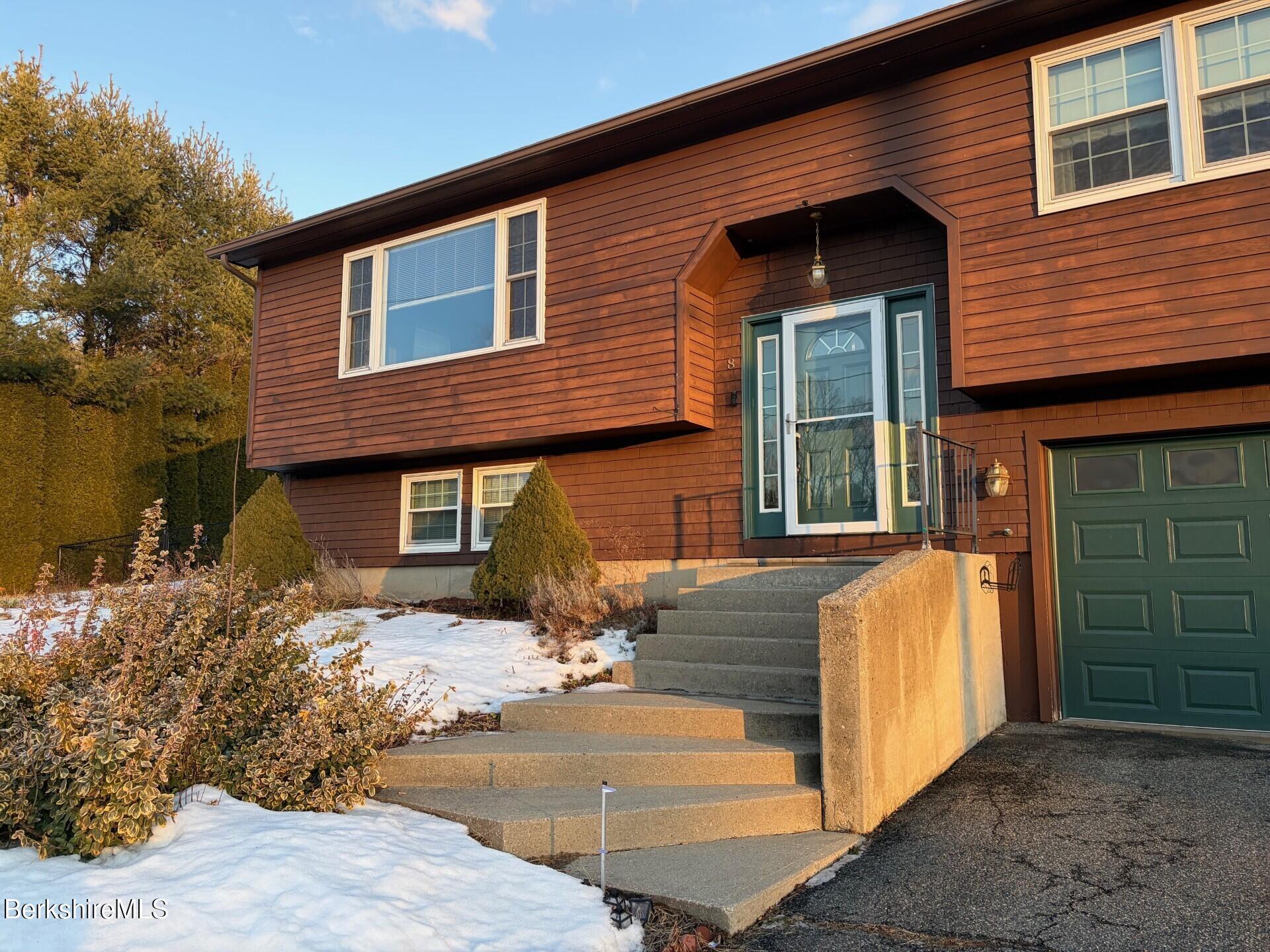 8 Country Road Adams, MA 01220 - Photo 3 of 44 a front view of a house with a yard