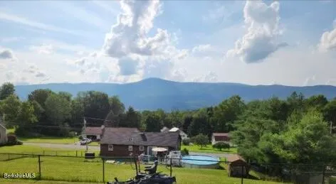 a view of an outdoor space and a yard