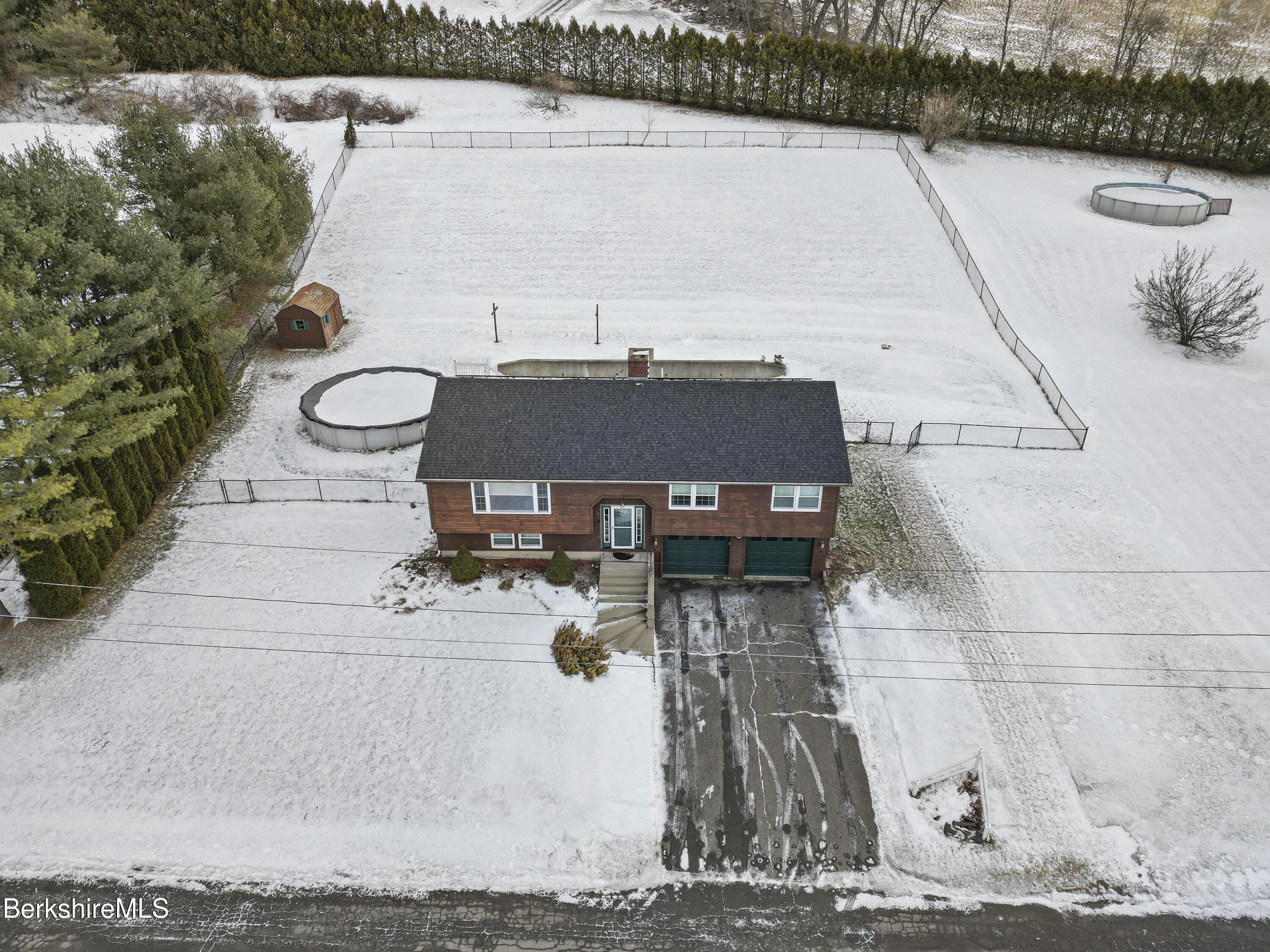 8 Country Road Adams, MA 01220 - Photo 5 of 44 a view of a terrace with furniture and a garden