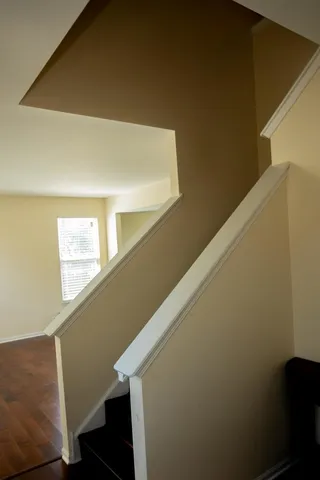 a view of balcony with furniture