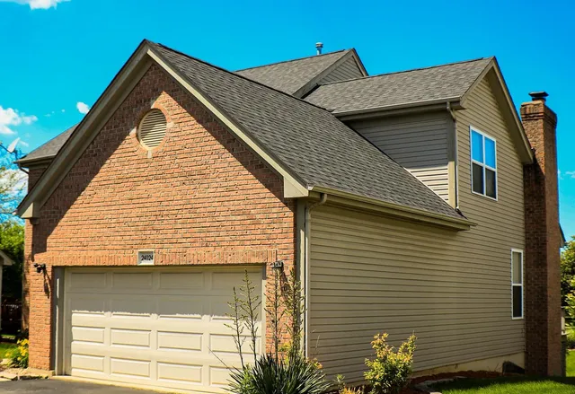 a view of a house with a garage
